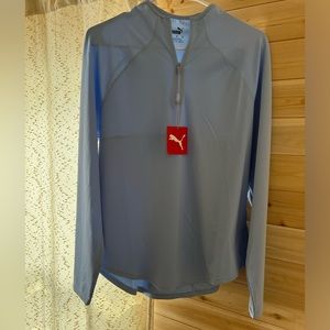 Puma golf half zip pull over